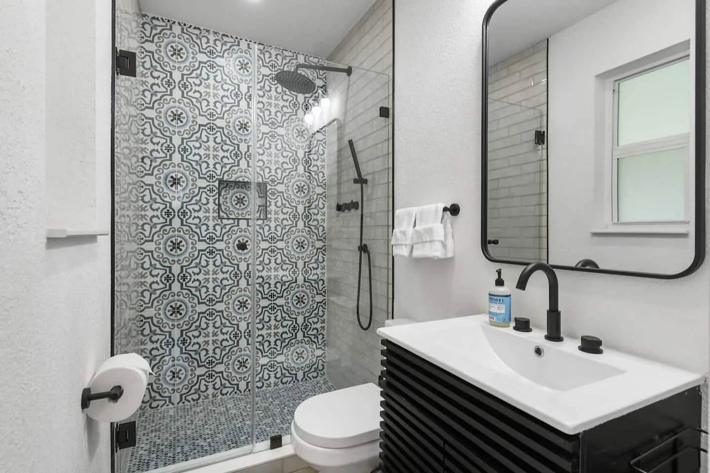 Enjoy endless hot water in the en suite bathroom walk-in shower. Shower has rain shower head and a wand.